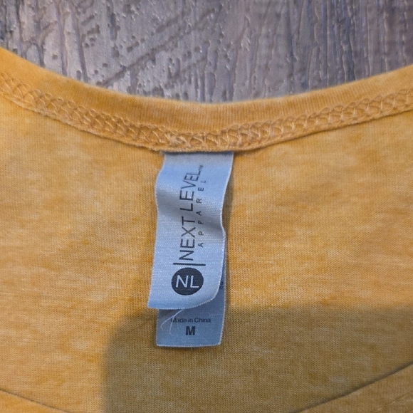 Next Level "Feelin' Cute" Dolly Parton Mustard Yellow Tank Top - Size M - Picture 2 of 7